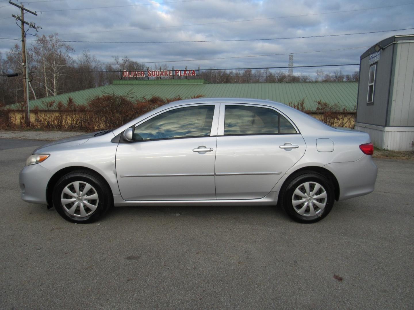 2009 SIlver /Gray Toyota Corolla LE (JTDBL40E299) with an 1.8L L4 DOHC 16V engine, 5-Speed Automatic Overdrive transmission, located at 6 Oliver Rd., Uniontown, PA, 15401, (724) 438-2024, 0.000000, 0.000000 - 2009 Toyota Corolla LE...GRAY CLOTH INTERIOR...POWER W/L/M/CRUISE...AM/FM CD...A/C...NEW TIRES...DON'T DELAY CALL TODAY!!! - Photo#7